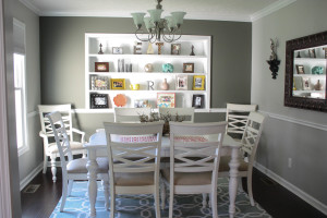 Renovated dining room with white painted built in shelves