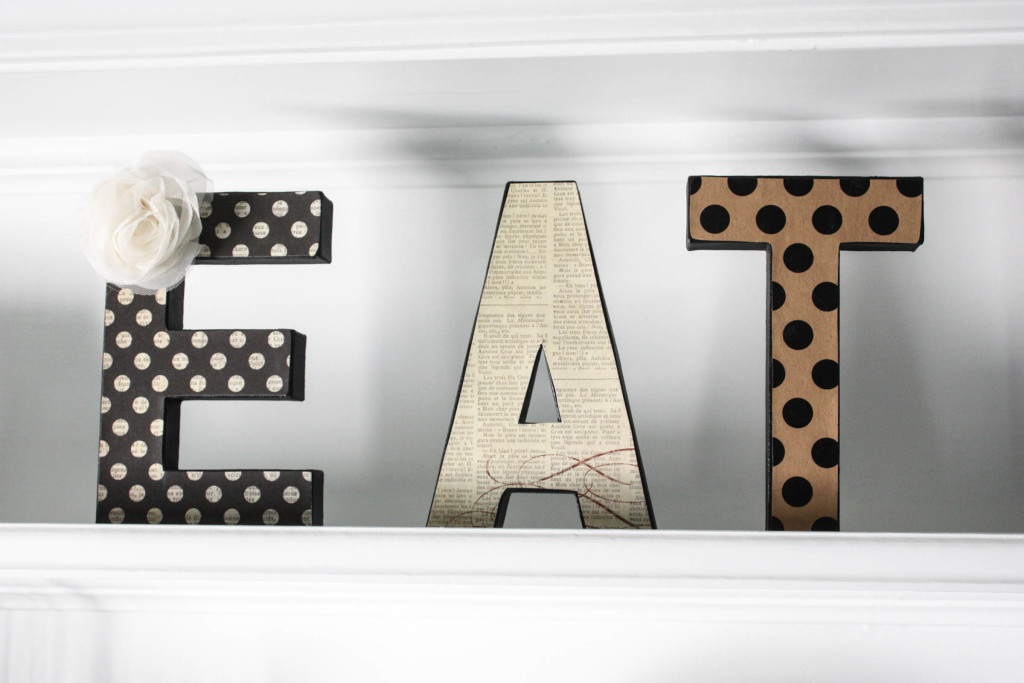 modge podge eat letters on decorative shelving