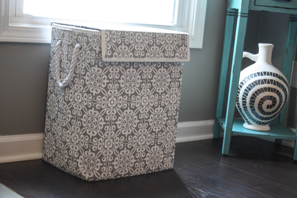 Laundry basket being used for toy storage.