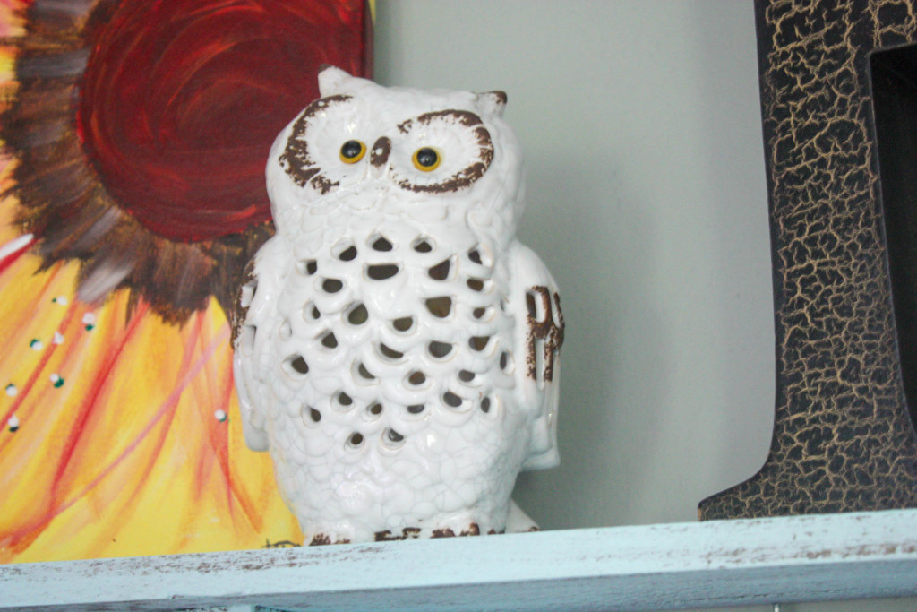 Ceramic owl on pallet coat rack
