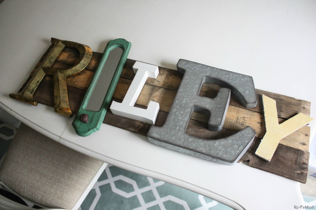 Pallet Name Sign made from pallet boards and random letters and home decor items