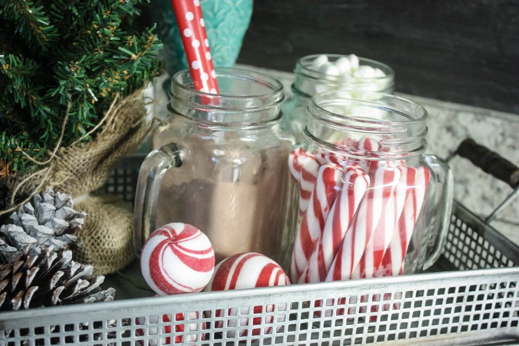 How to make a hot cocoa bar from Dollar Tree items! You don't have to be extravagant to have a beautiful little set up on the cheap! Check it out!
