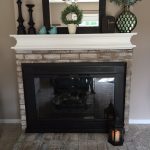 How to Whitewash Brick and Paint your Brassy Fireplace