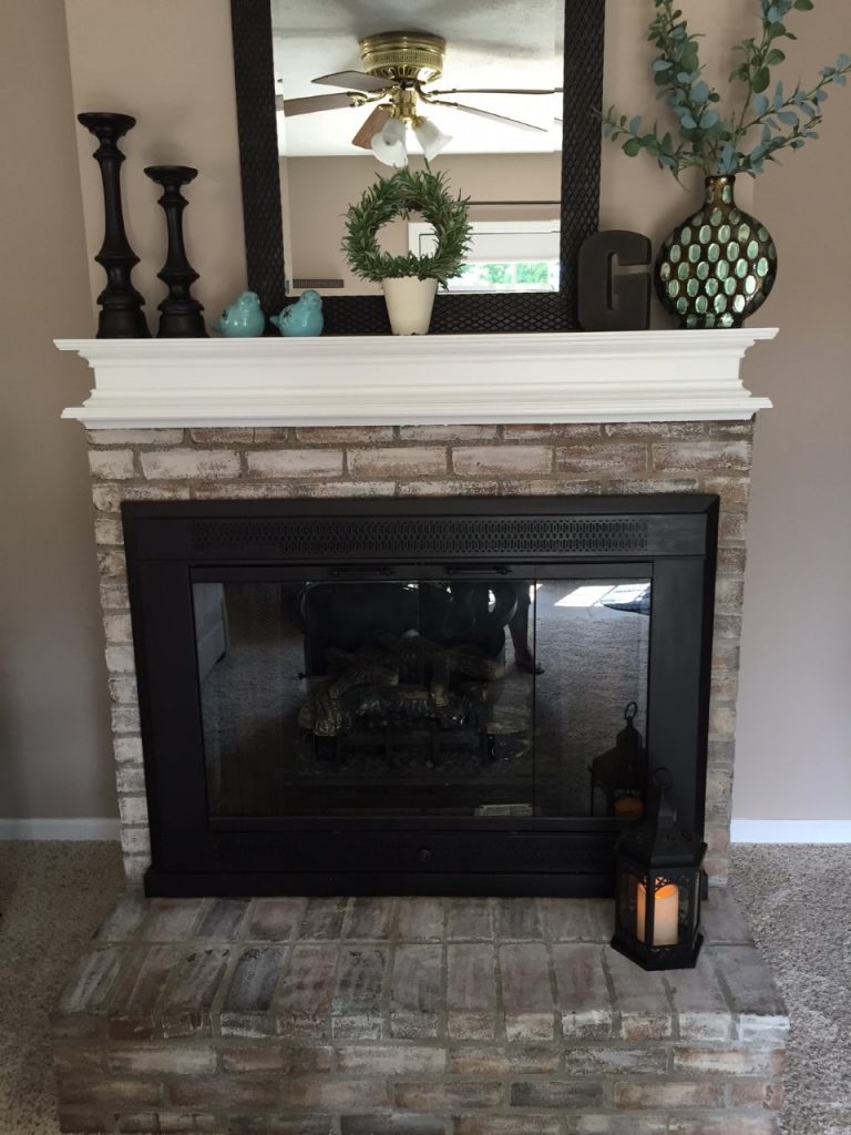 How to whitewash a fireplace AND how to paint over that brassy, outdated finish! This post has awesome information about updating your fireplace--all in 1 place!