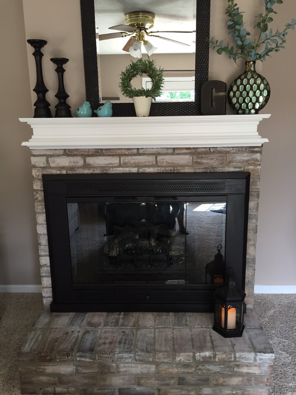 How to Whitewash Brick and Paint your Brassy Fireplace