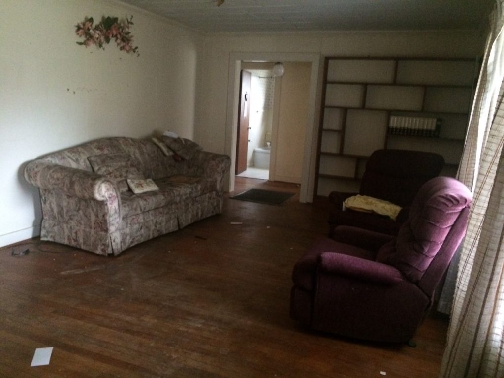 Cottage Charmer fixer upper home - before picture-living room