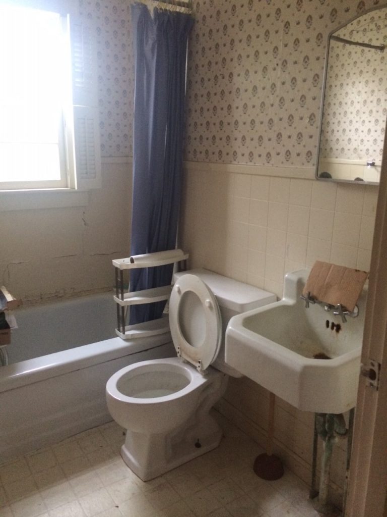 fixer upper house-bathroom before