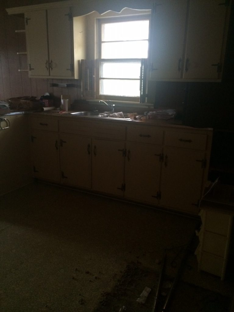 fixer upper home before picture-kitchen cabinets