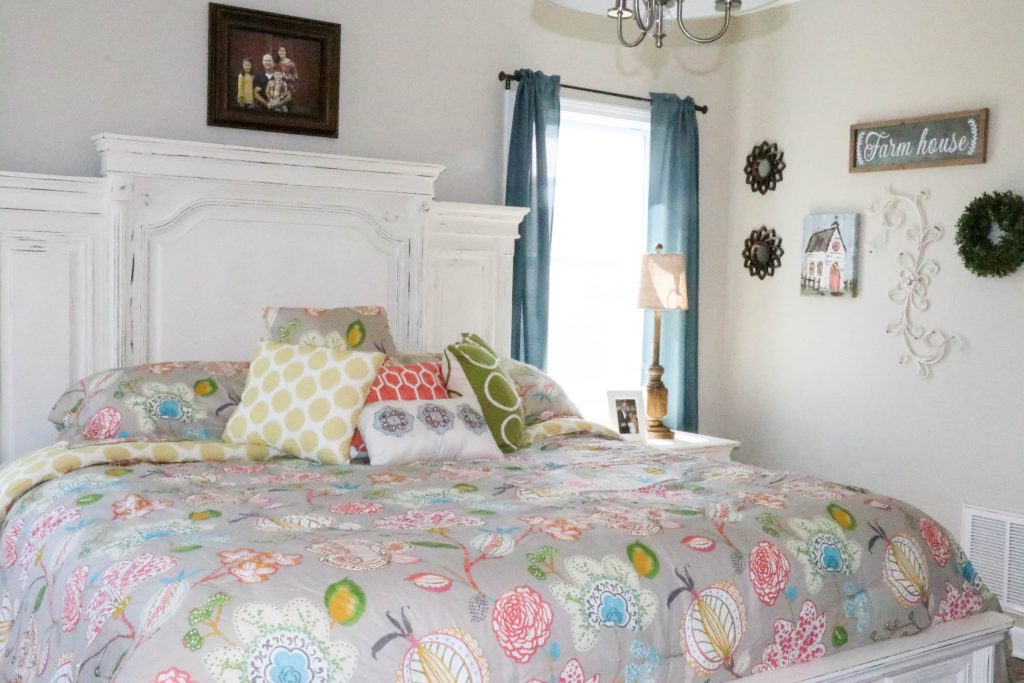 Amazing transformation of a dark and dreary master bedroom into an aqua & coral master bedroom retreat!