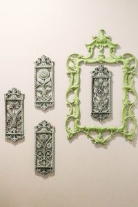 Thrifted wall decor turned beautiful bathroom collage!