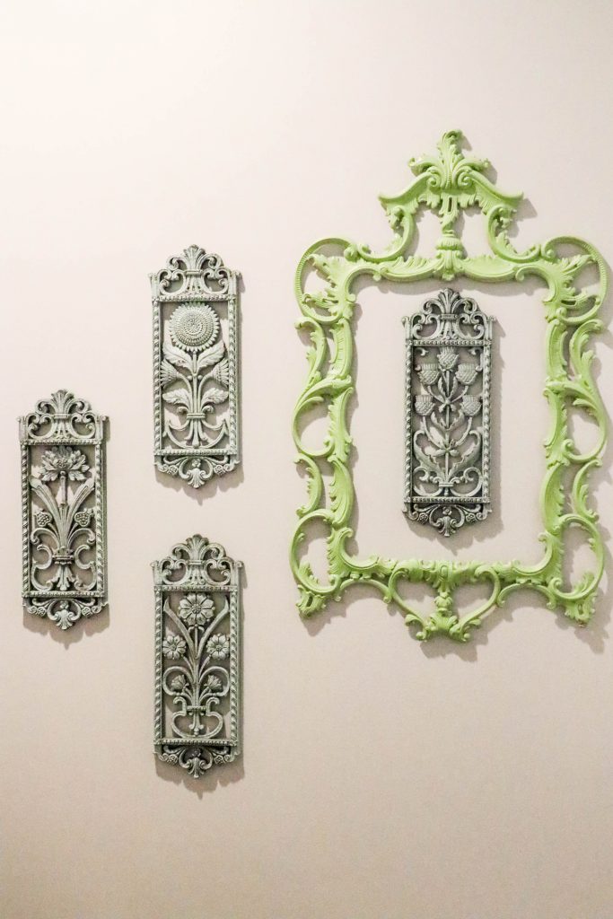 Thrifted wall decor turned beautiful bathroom collage!