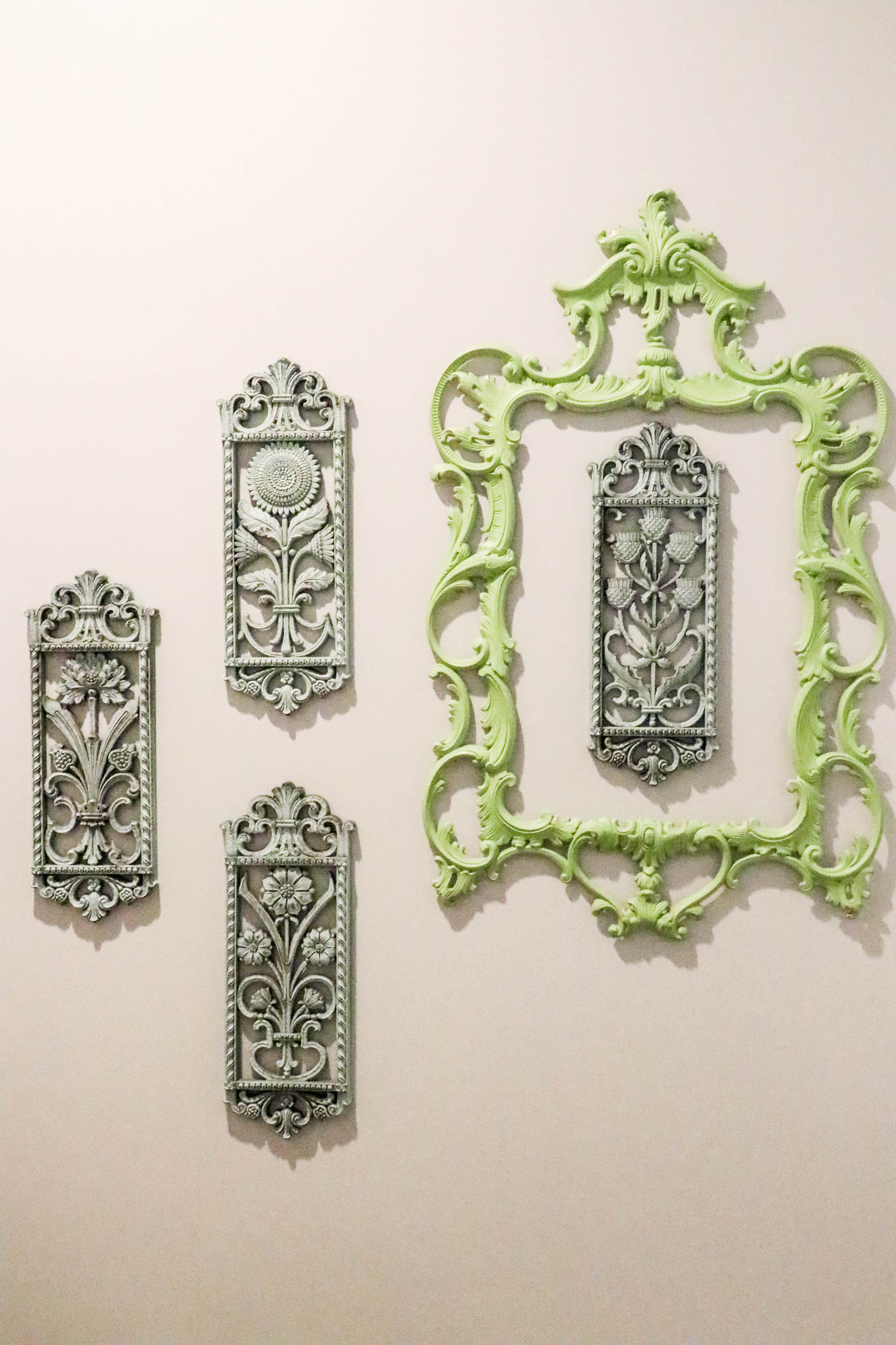 Thrifted wall decor turned beautiful bathroom collage!