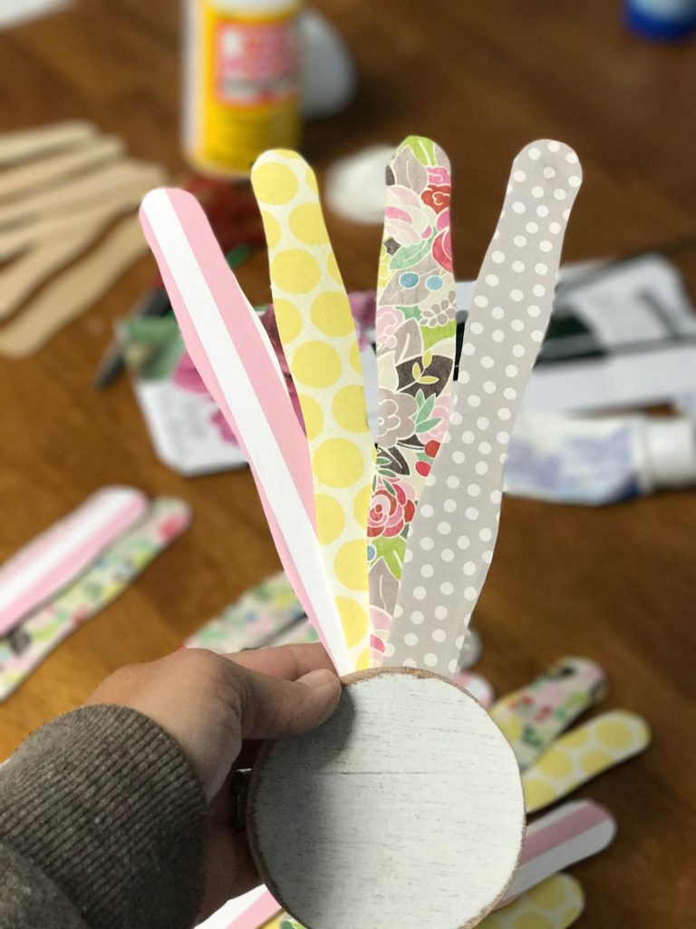 Super Easy DIY Popcicle Stick Wall Flower! Tons of possibilities for this one! FULL tutorial on her blog!