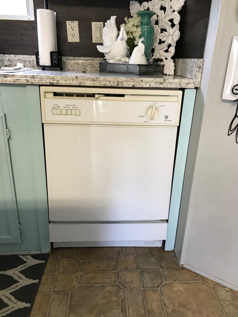 This dingy dishwasher was completely transformed with PAINT! You heard right...a painted dishwasher! You have got to see this!