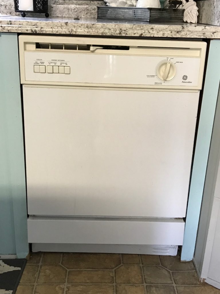 This dingy dishwasher was completely transformed with PAINT! You heard right...a painted dishwasher!  You have got to see this!