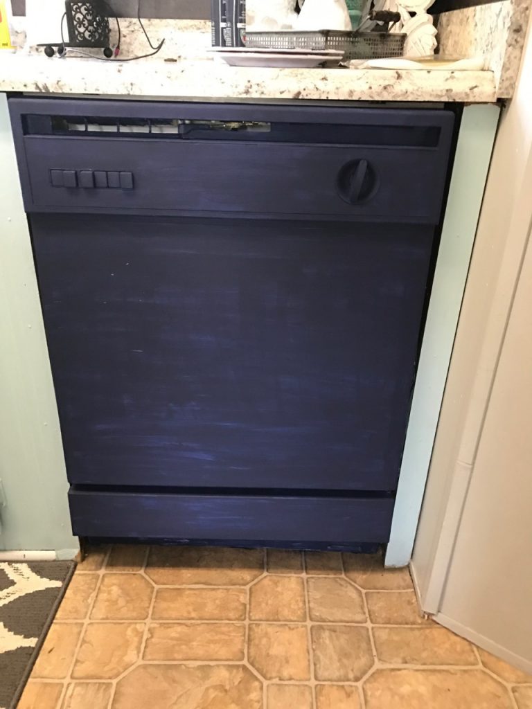 This dingy dishwasher was completely transformed with PAINT! You heard right...a painted dishwasher!  You have got to see this!