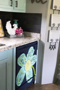 This dingy dishwasher was completely transformed with PAINT! You heard right...she painted her dishwasher! You have got to see this!