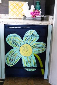 This dingy dishwasher was completely transformed with PAINT! You heard right...she painted her dishwasher! You have got to see this!