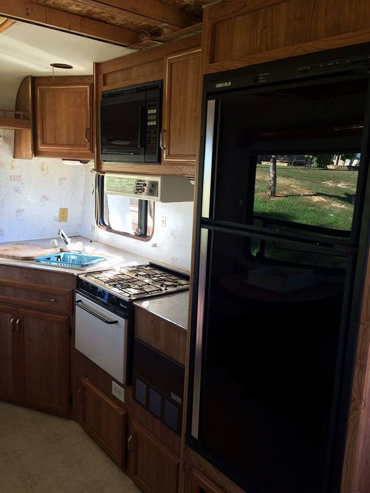 GORGEOUS free camper makeover on a tight budget! These before and afters are amazing! A must see project.