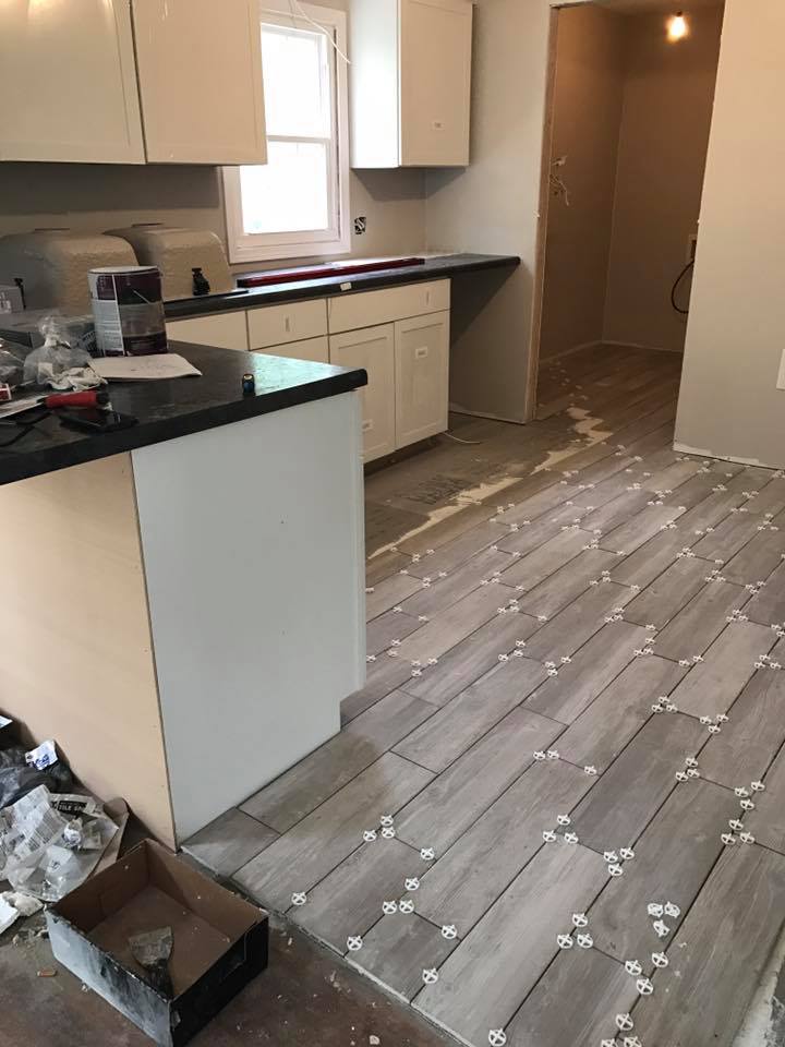Cottage Charmer Fixer Upper- kitchen update! This flooring is amazing! This house is truly going to be an unbelievable renovation!