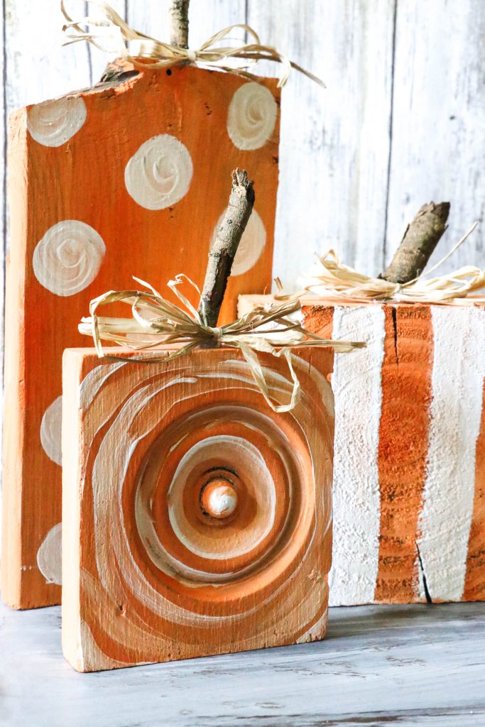 un and Easy DIY Scrap Wood Pumpkins! The little stems are simply sticks from the yard, and the wood is scraps found on the ground or leftover from previous projects! Check it out! Definitely a must pin for Fall!