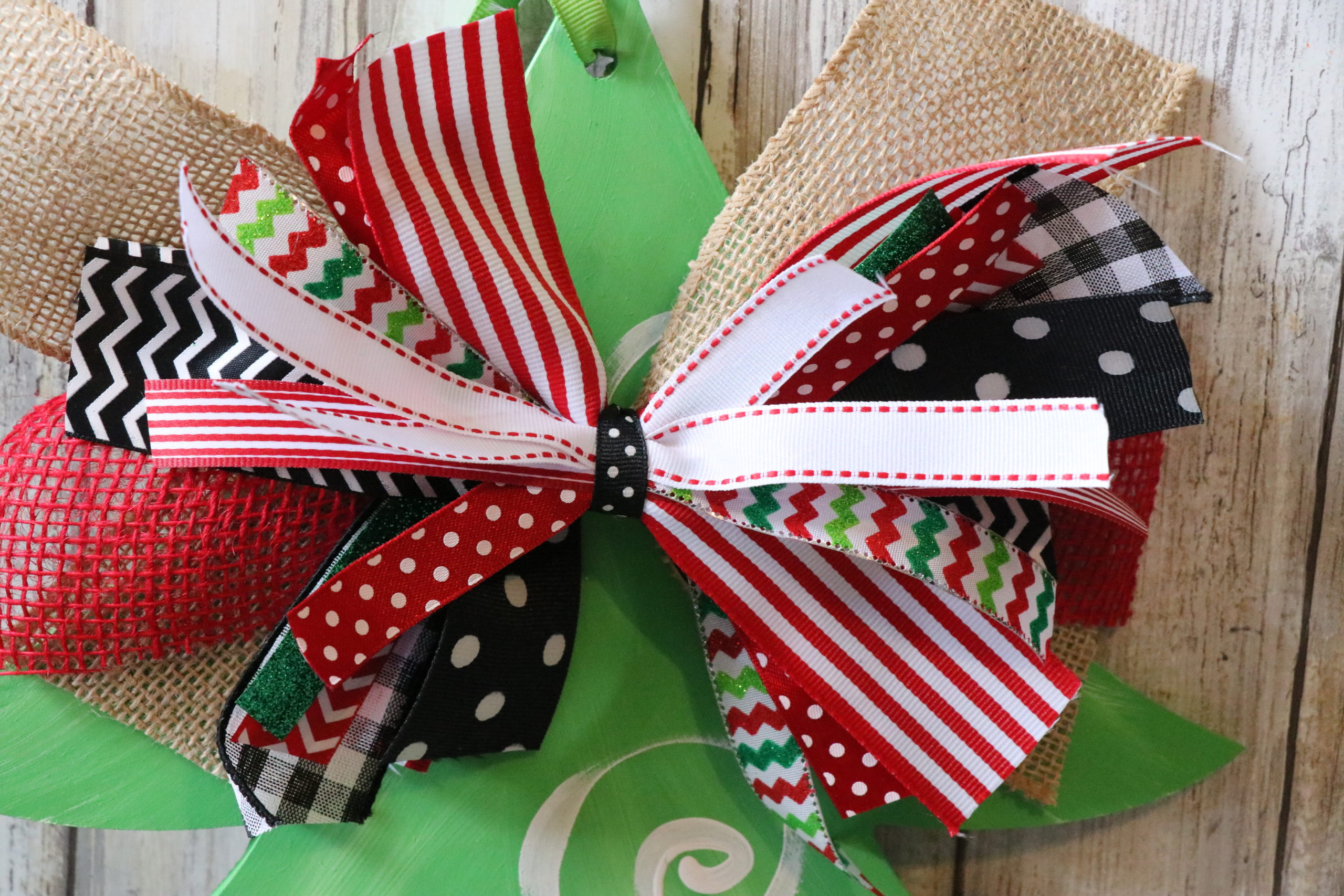 CHRISTMAS BOWS FOR PRESENTS DIY USING LEFTOVER RIBBON FROM DOLLAR