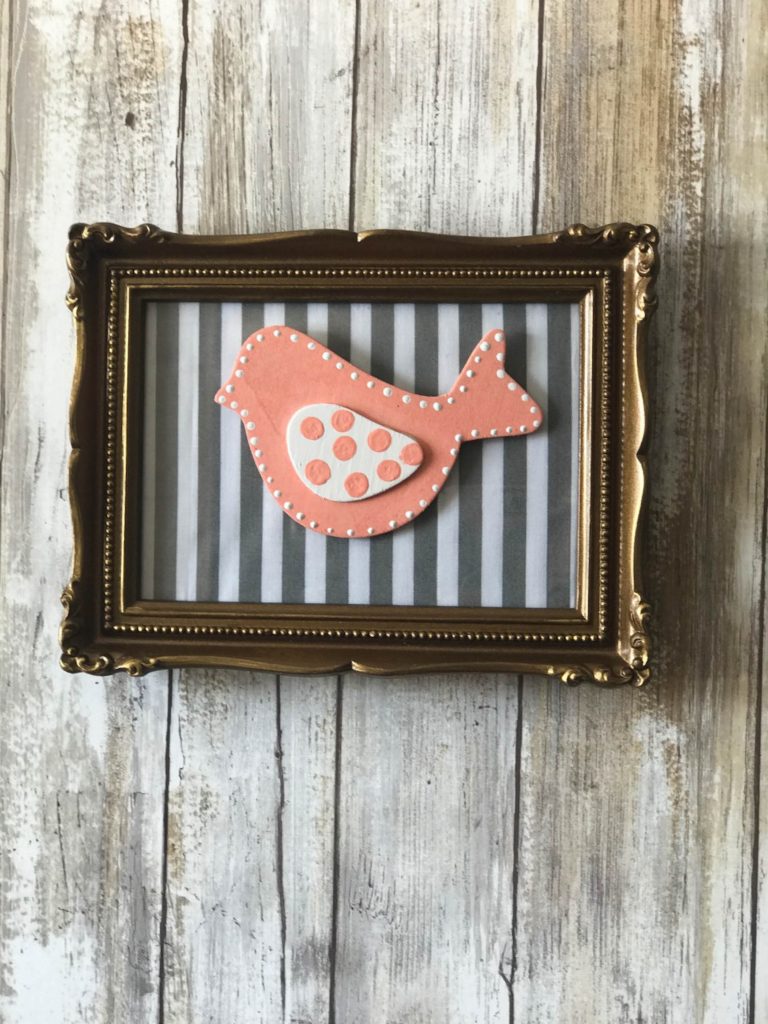 Thrifted Fabric Frame with bird attachment that can be changed with the seasons!