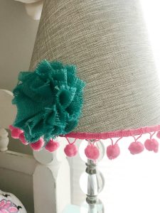 This super cute and easy DIY transformed this plain jane lamp into the cutest accessory for this little girl's room!