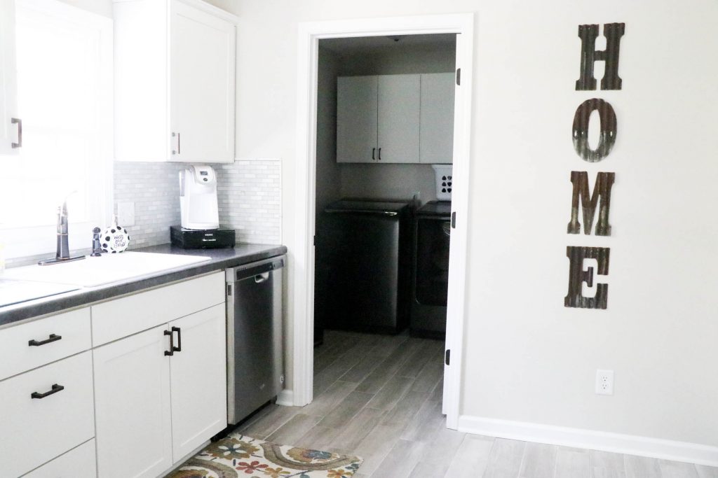 The most amazing transformation of a cottage charmer home that I have seen. It is truly unreal the difference. And what a gorgeous neutral "Behr Mineral" wall color provided by Behr Paint! AMAZING!