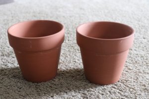 Super cute Dollar Tree flower pots covered in Fabric with cute little succulents! This is ADORABLE!