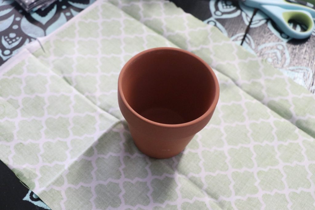 Super cute DIY Fabric Covered Flower Pots with Dollar Tree materials and cute little succulents! This is ADORABLE!