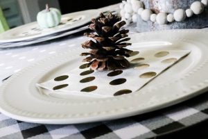 pinecone on layered fall tablescape