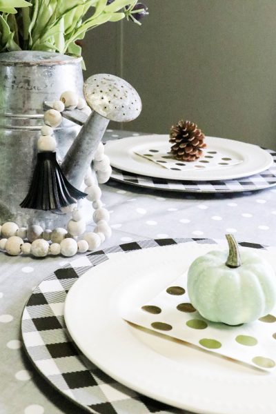 mini fall tablescape setting on a table