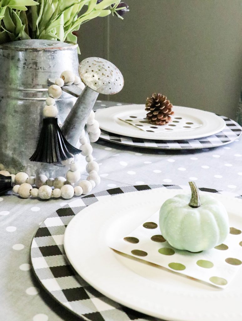 mini fall tablescape setting on a table