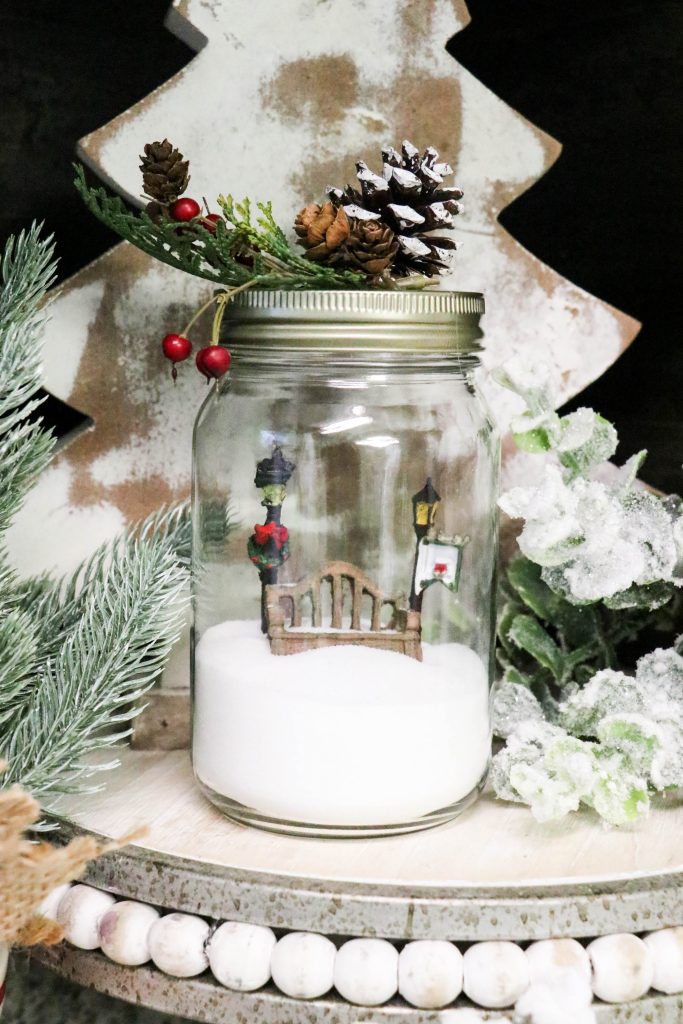 DIY Dollar Tree Jar made into a snow globe.