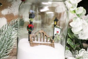 DIY Dollar Tree Jar made into a snow globe.