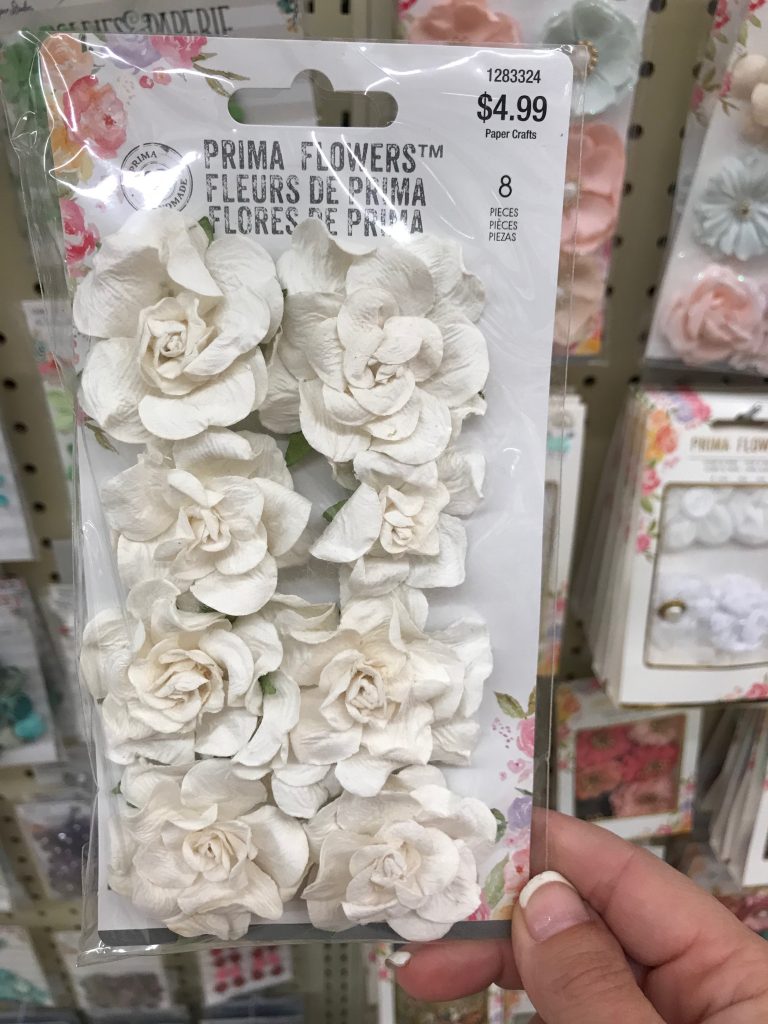 Flower embellishments used to make over a Dollar General chalkboard