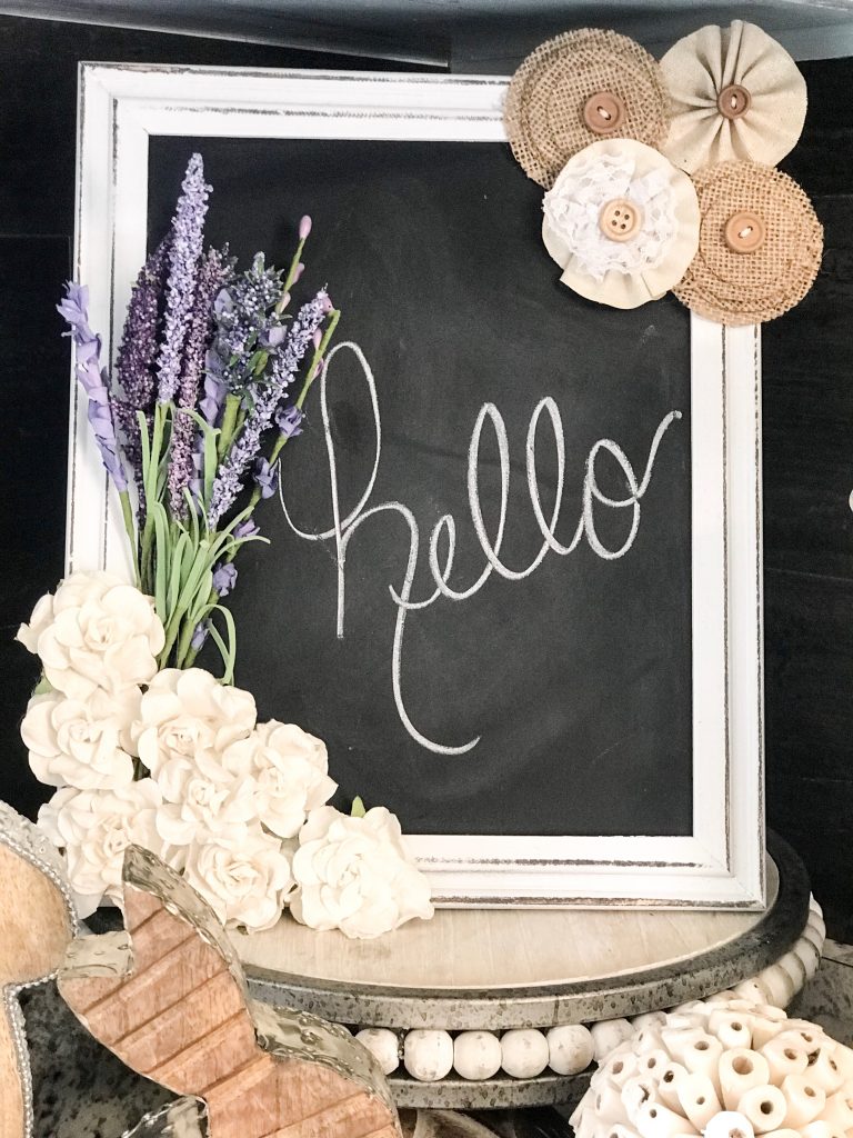 Make over a $6 Dollar General chalk board with flower embellishments!