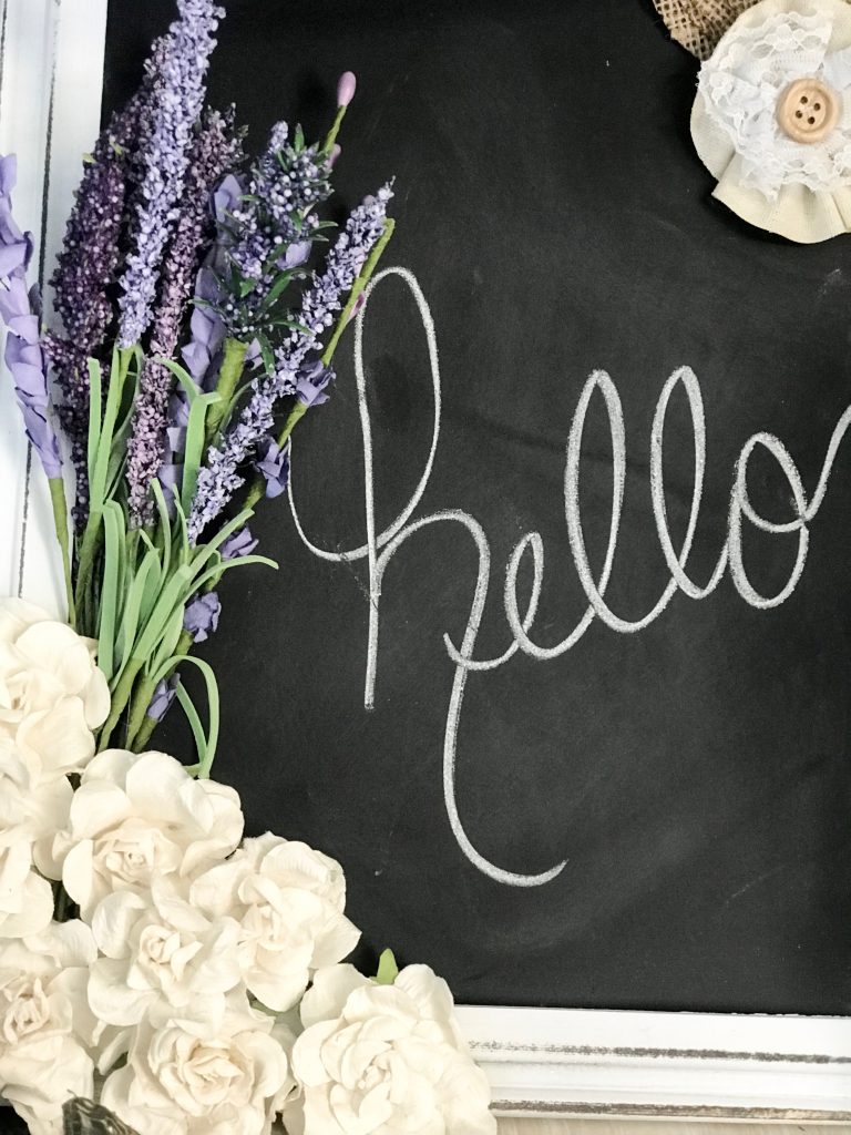 Make over a $6 Dollar General chalk board with flower embellishments!