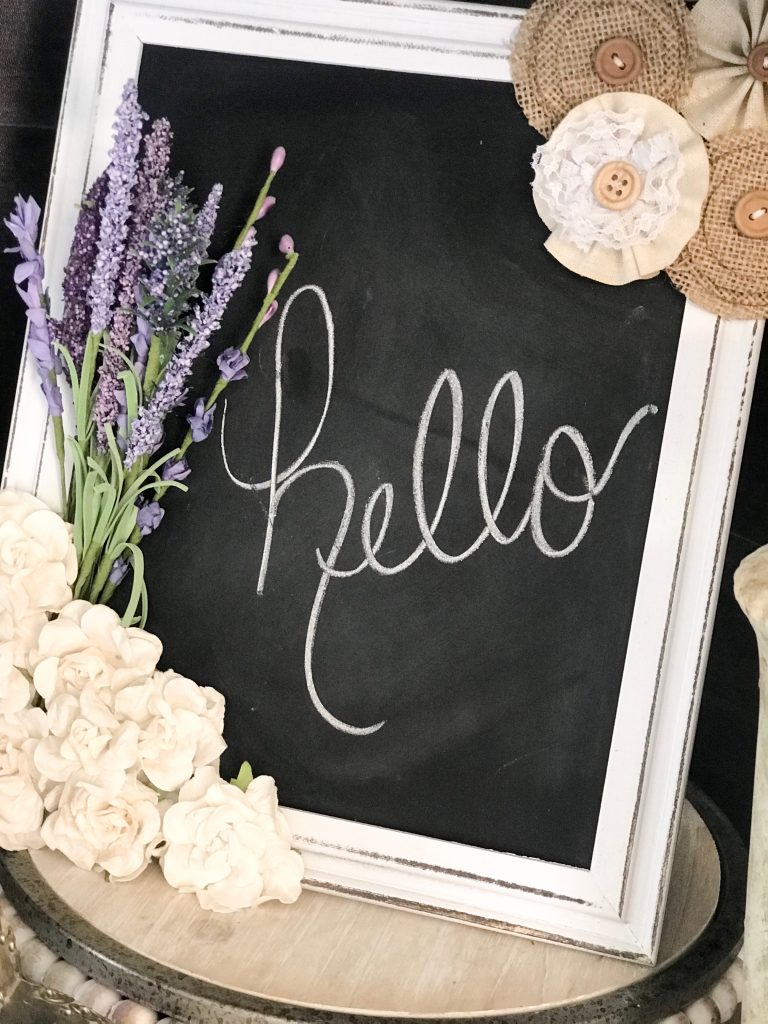 Make over a $6 Dollar General chalk board with flower embellishments!