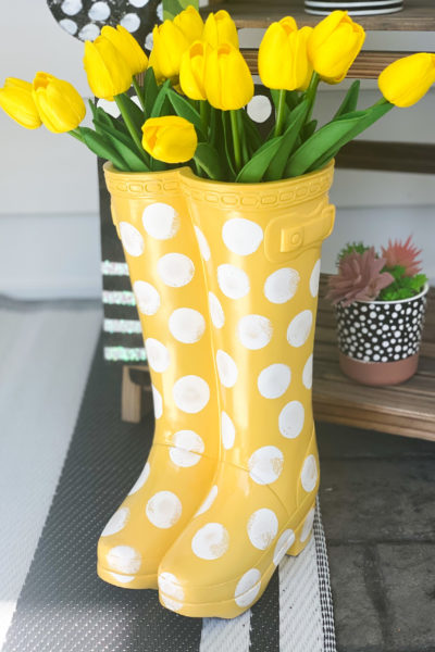 yellow rubber boot flower planter from big lots painting on white polka dots