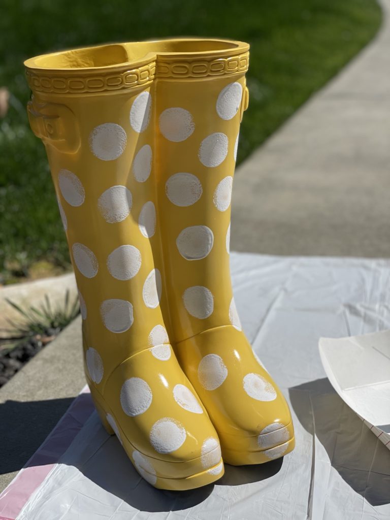 yellow rubber boot flower planter from big lots painting on white polka dots