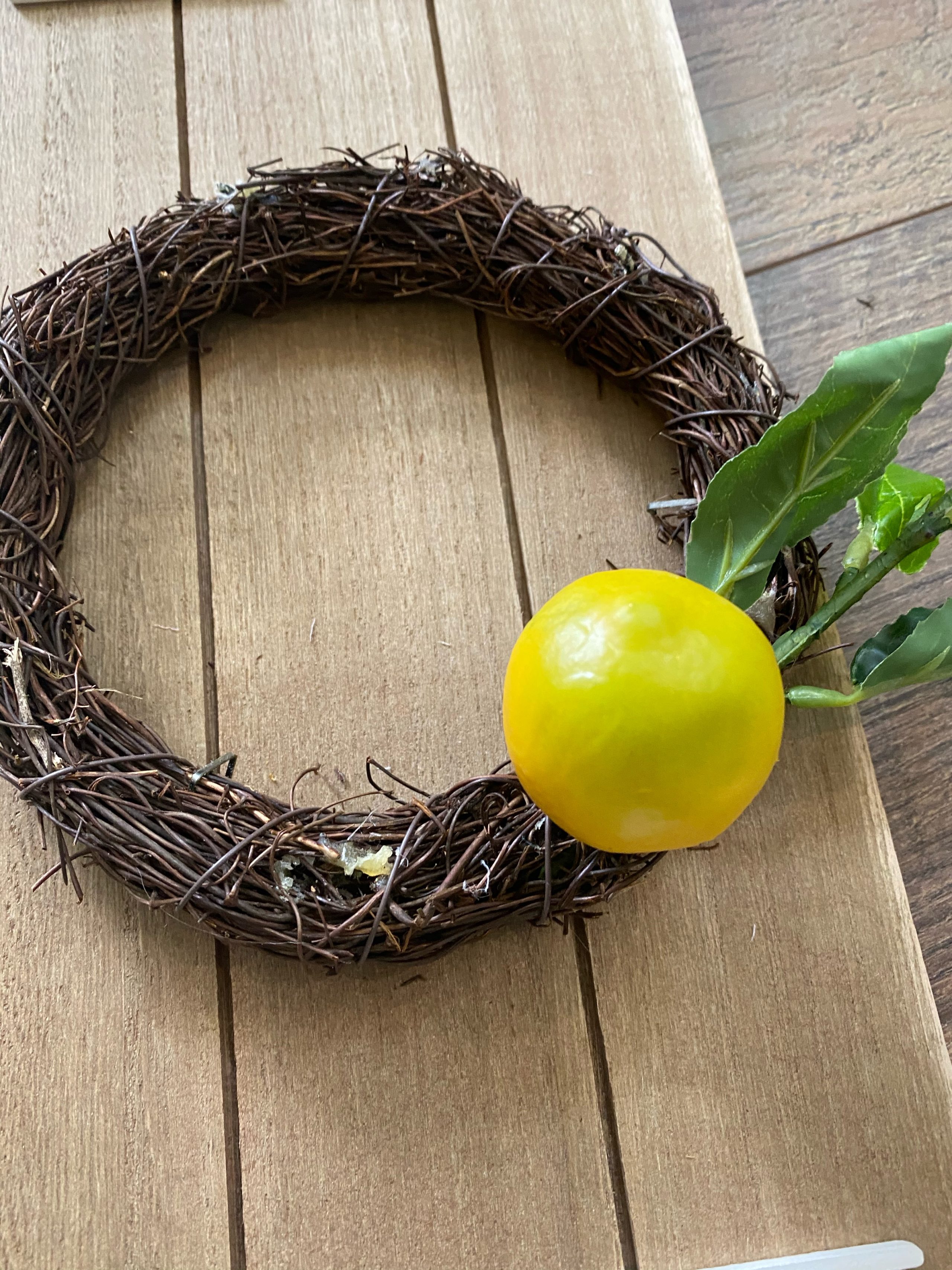 adding lemons onto big lot's welcome sign wreath