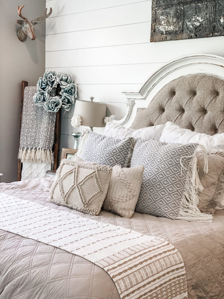 neutral bedding with table runner on end