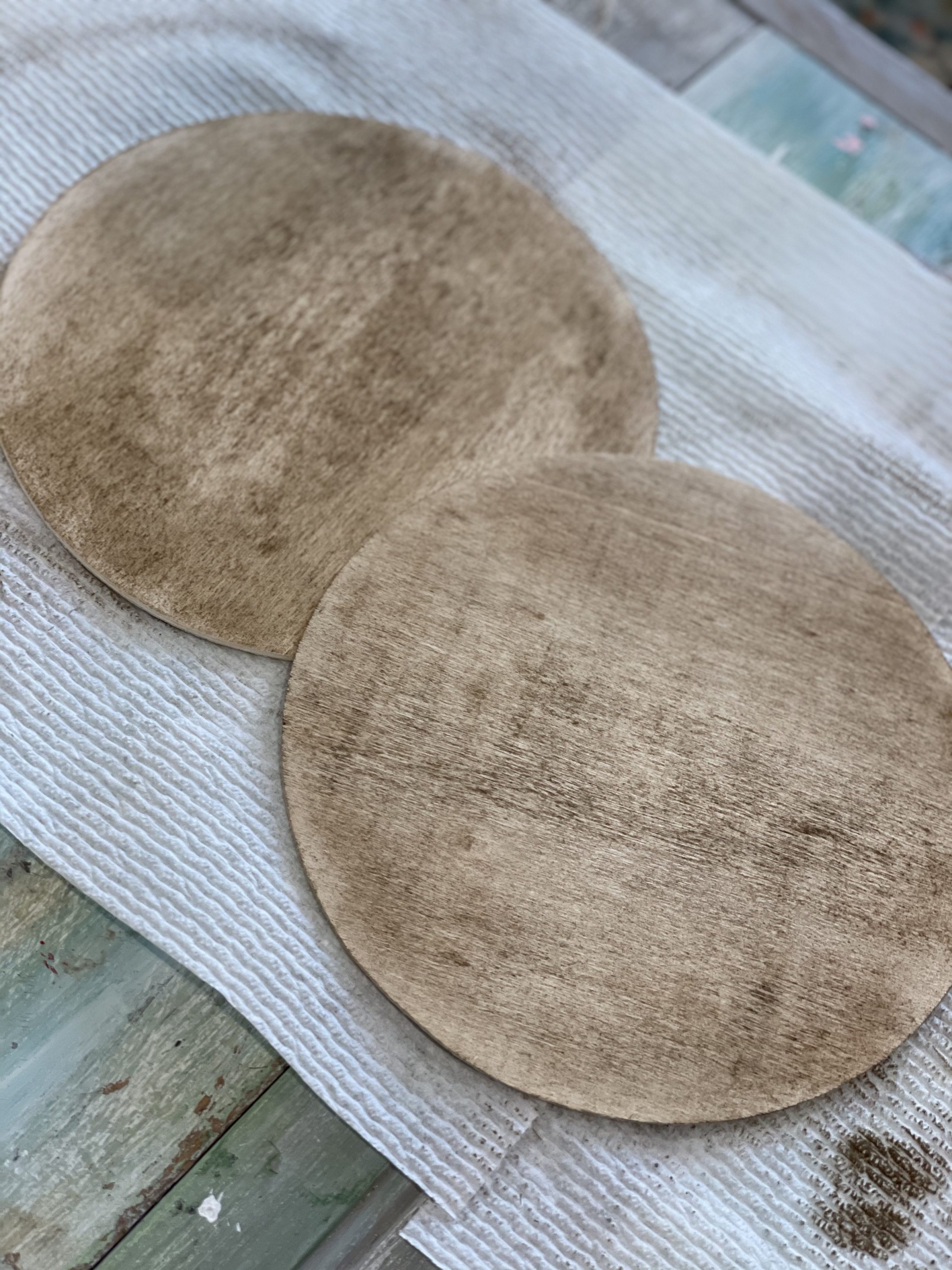 both stained wooden circles