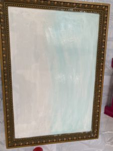goodwill painting in the process of being painted for wildflowers. painted the backdrop white and added blue