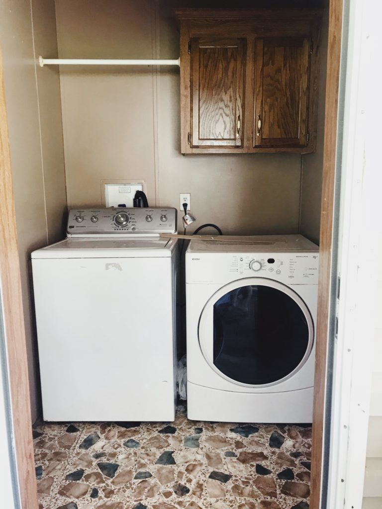 laundry room in a mobile home before 