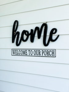 home sign on front porch