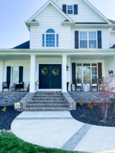 modern home with spring front porch decor