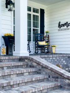modern home with spring front porch decor